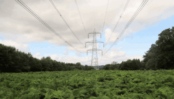 Electricity transmission lines in the English country.